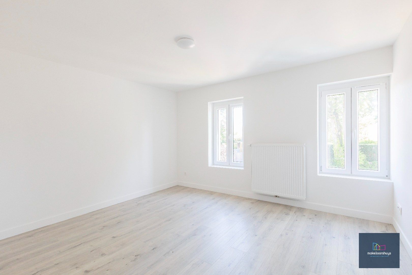 Instapklare energiezuinige woning met 3slpk tuin en staanplaats foto 15