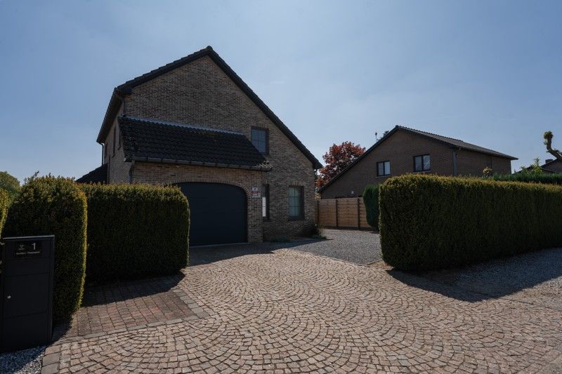 Energiezuinige woonhuis met 3 slaapkamers op een perceel van 6 a en 15 ca. foto 3