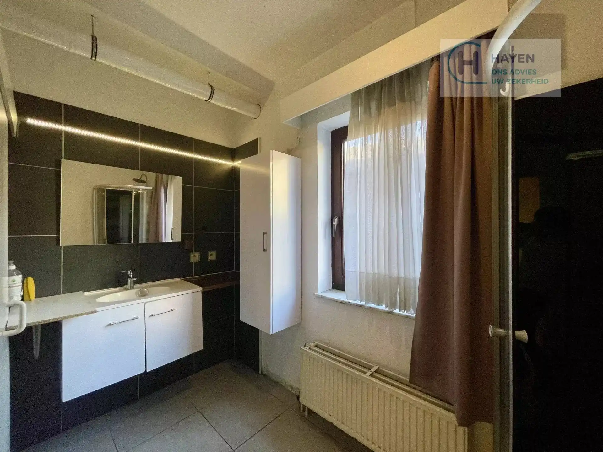 Instapklaar 1-slaapkamerappartement met gezellig balkon in het centrum van Tongeren foto 9