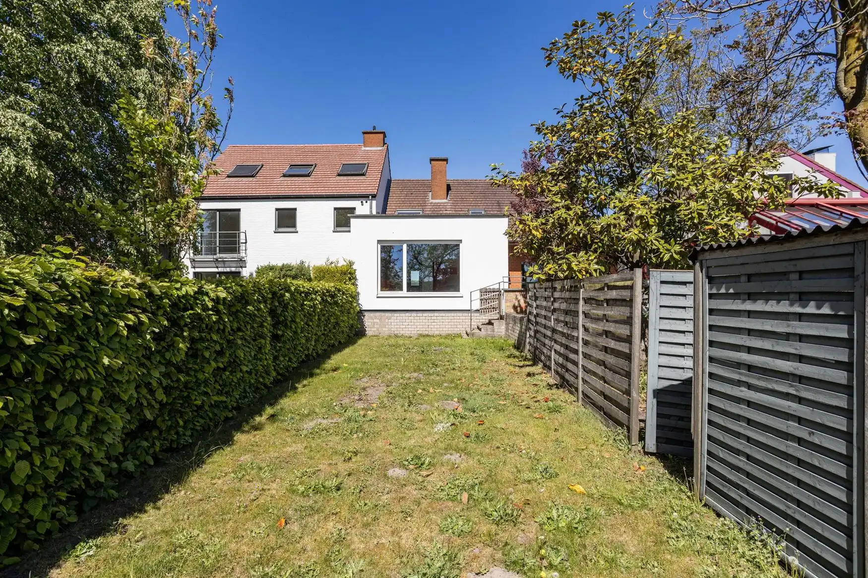 Ruime woning met zuidgerichte tuin en open zicht. foto 19