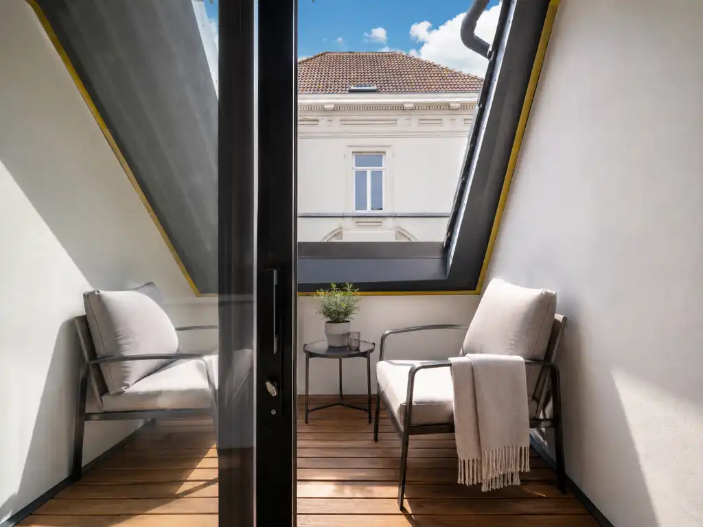 Hoogwaardig gerenoveerd duplex appartement met zonnig terras in het centrum van Gent foto 3
