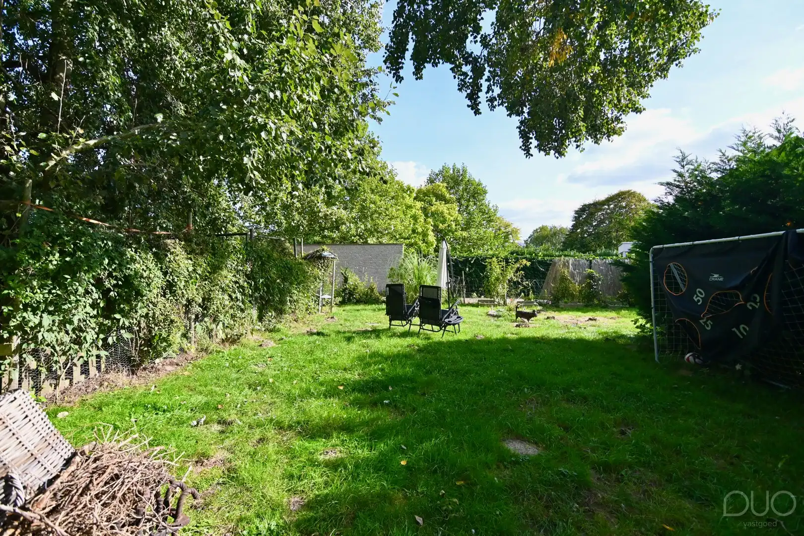 Ruim pand - makkelijk op te delen in 2 appartementen en grote tuin in het centrum van Zepperen foto 2