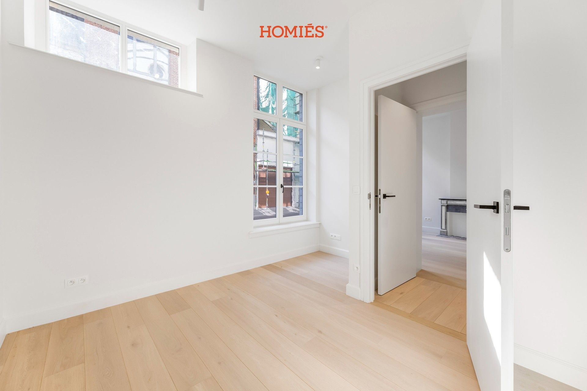 High-end gelijkvloers appartement met tuin, in historisch pand foto 9