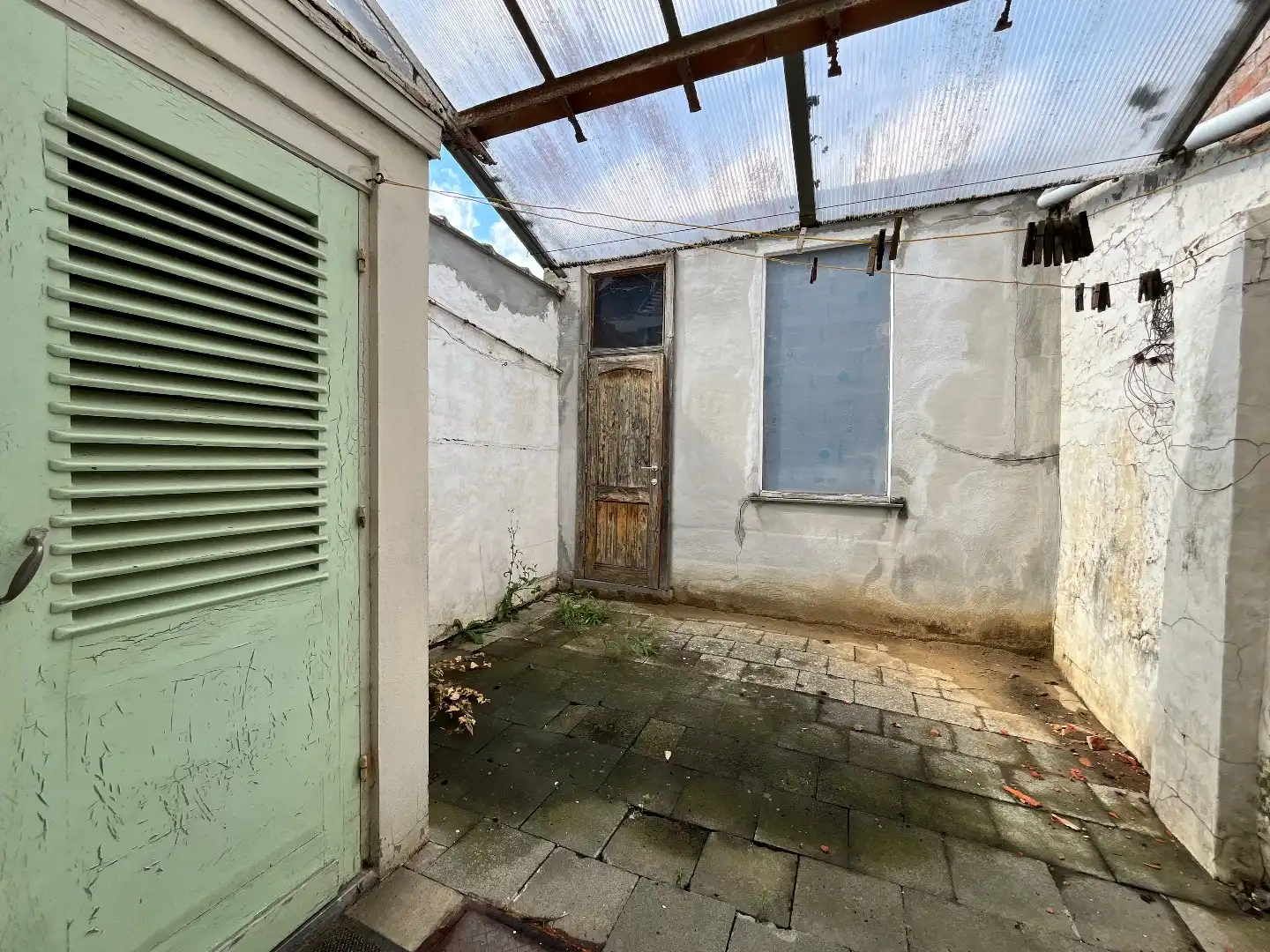 Te renoveren stadswoning met 4 slpk, koer en garage foto 23