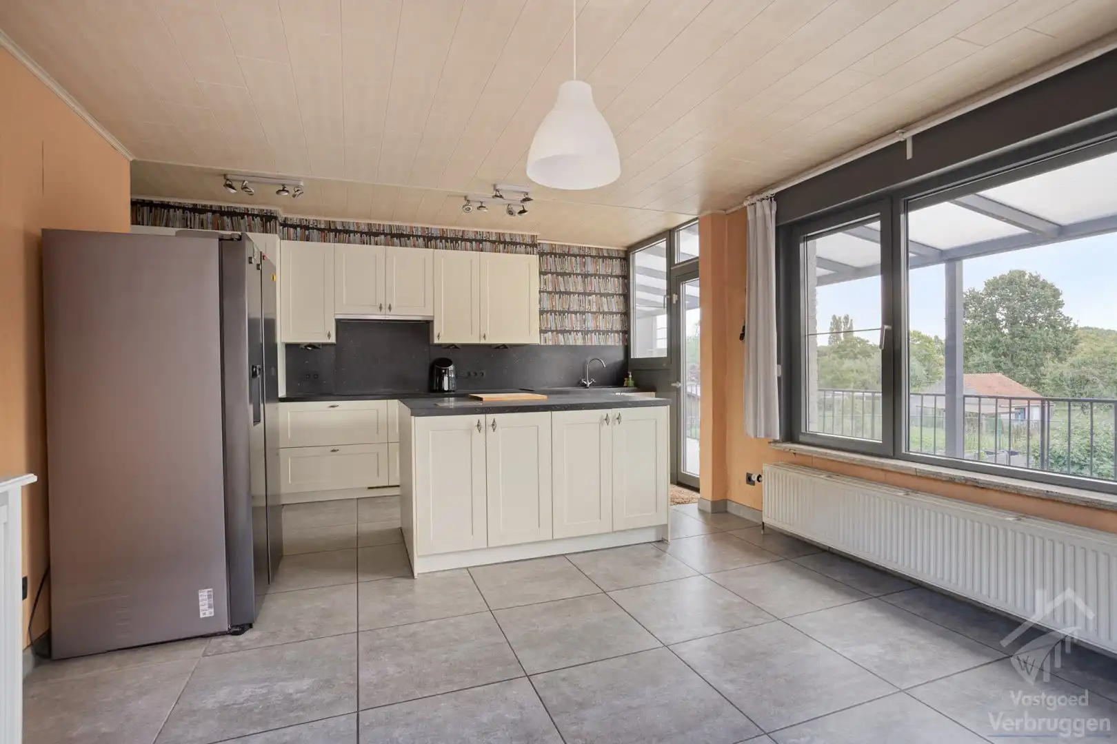 Volledig onderkelderde bungalow te koop op groot perceel foto 5