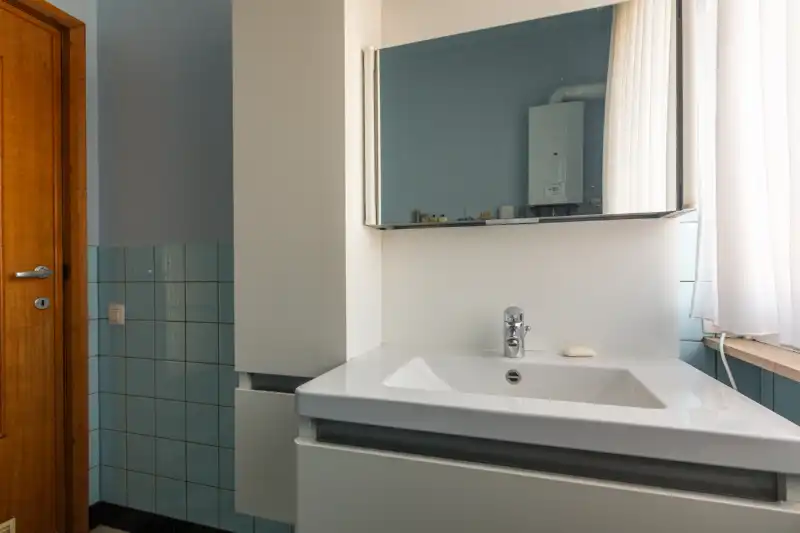 Te moderiseren woning met tuin garage en 3 slaapkamers (meer mogelijk). Sint-Elisabethwijk! foto 12