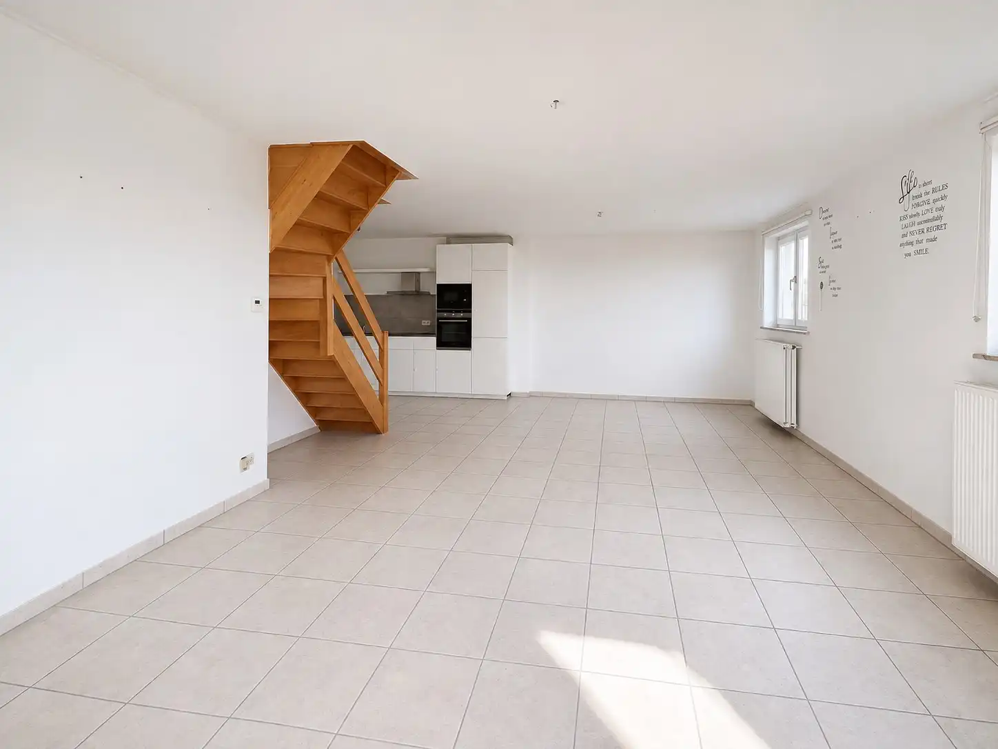 Ruim duplexappartement met 3 slaapkamers nabij het centrum. foto 3