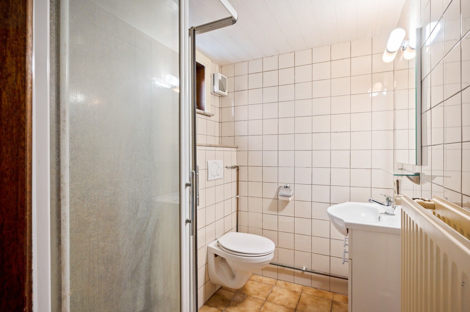 Te renoveren woning met tuin en garage in Wolfsdonk! foto 12
