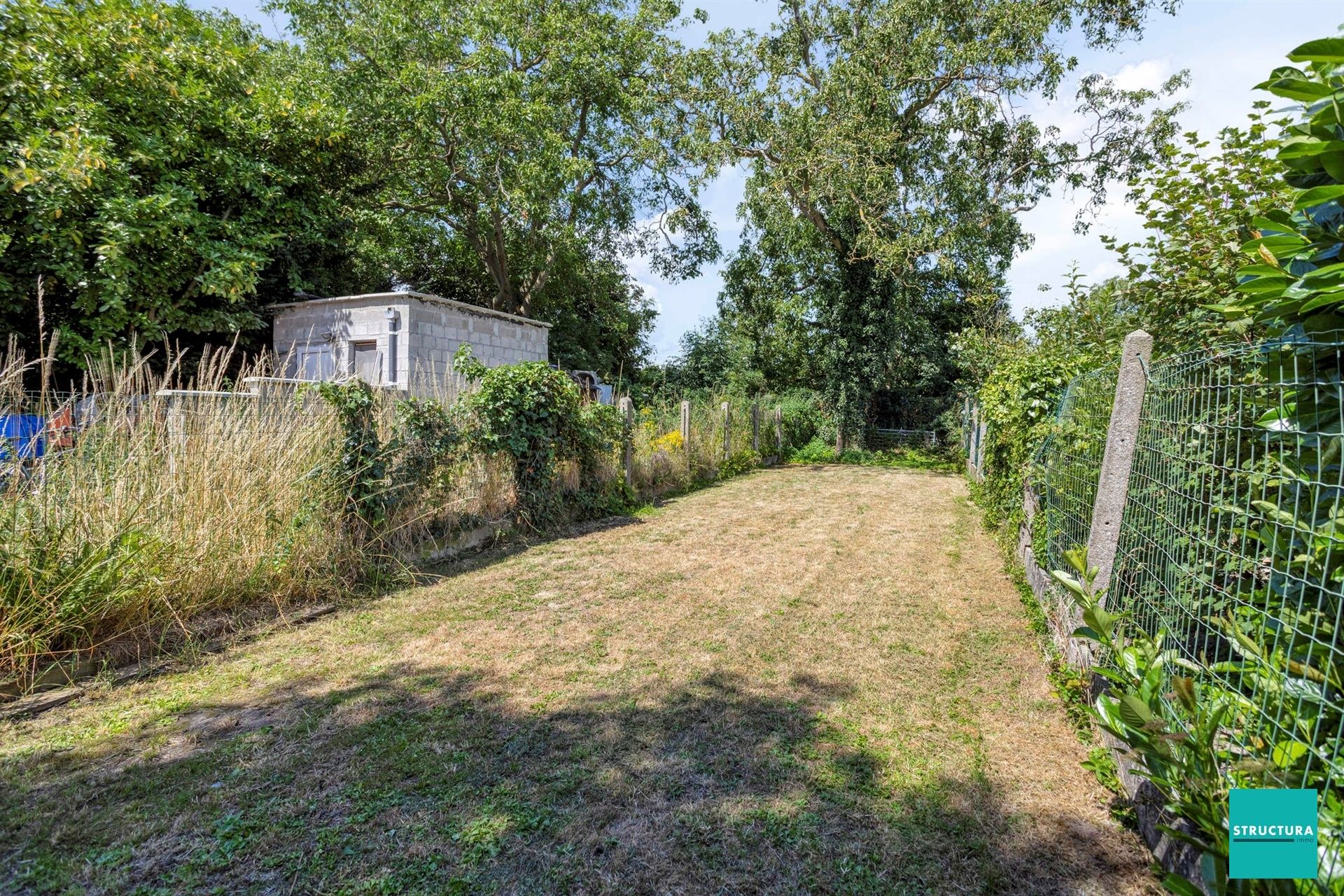 Instapklare woning met karakter in hartje Merchtem foto 21