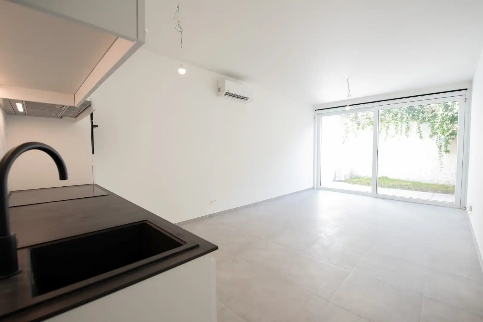 Instapklaar éénslaapkamerappartement met stadstuin foto 5
