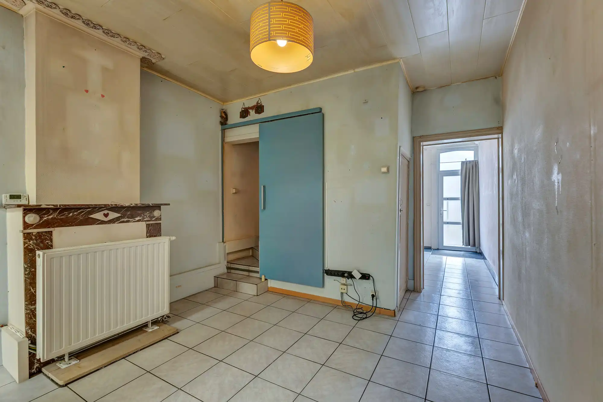 Te renoveren rijwoning met tuin foto 4