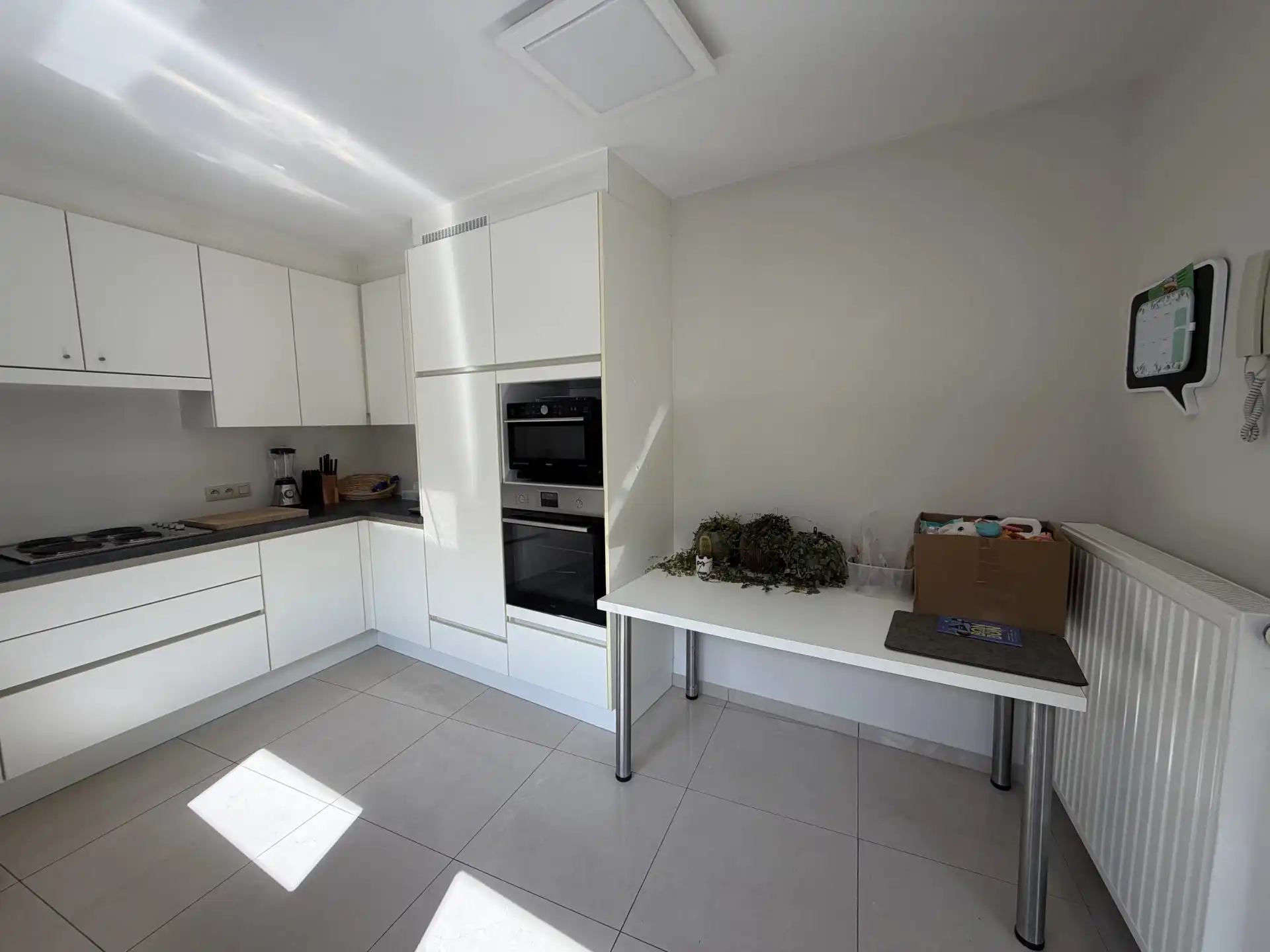 Te Huur : Verzorgde en ruime woning met 2 slaapkamers en garage in centrum Bilzen foto 9