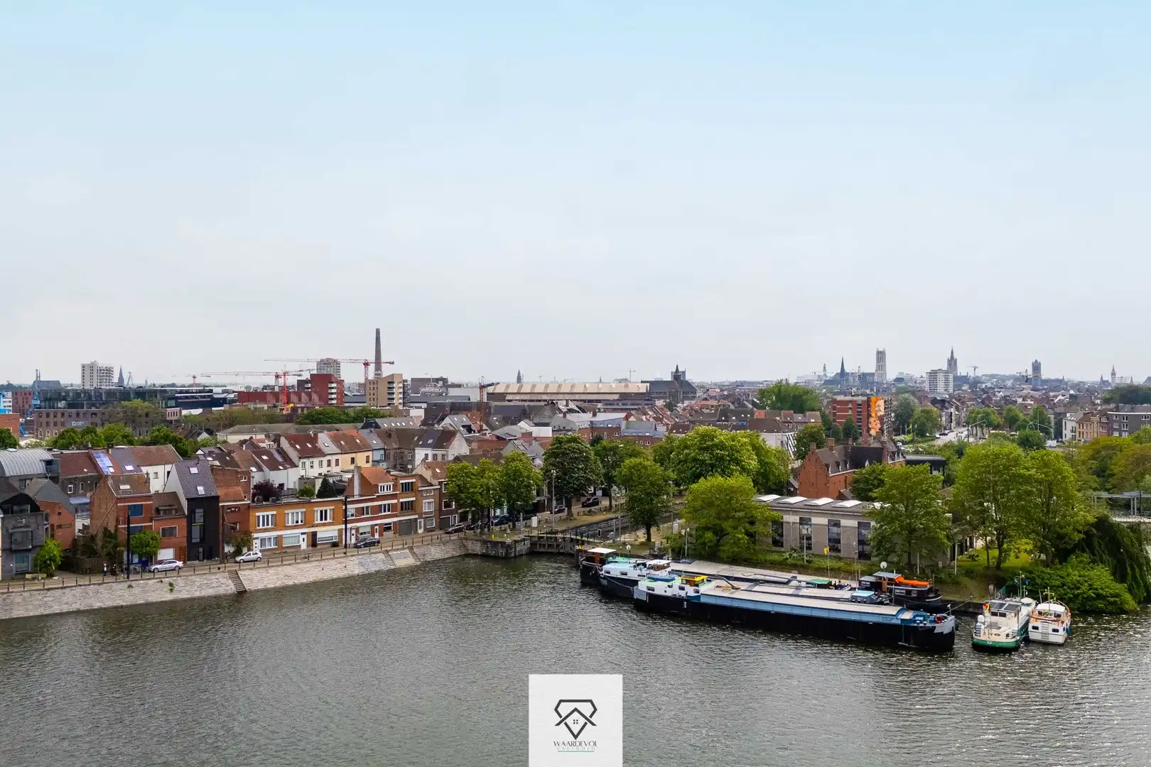 Unieke reconversie nieuwbouw aan het water met 3 slaapkamers in Gent foto 5