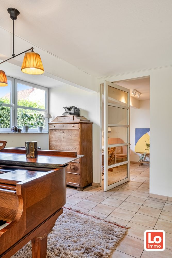 VERKOCHT! Charmante open woning met carport en héél grote aangename tuin gelegen op een toplocatie vlakbij het centrum van Zaffelare! foto 12