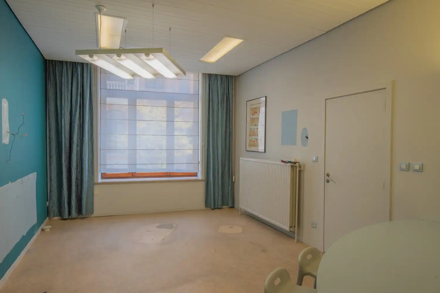 Voormalige tandartspraktijk met ruim duplexappartement, parking en zonnig dakterras in het centrum van Aarschot foto 5