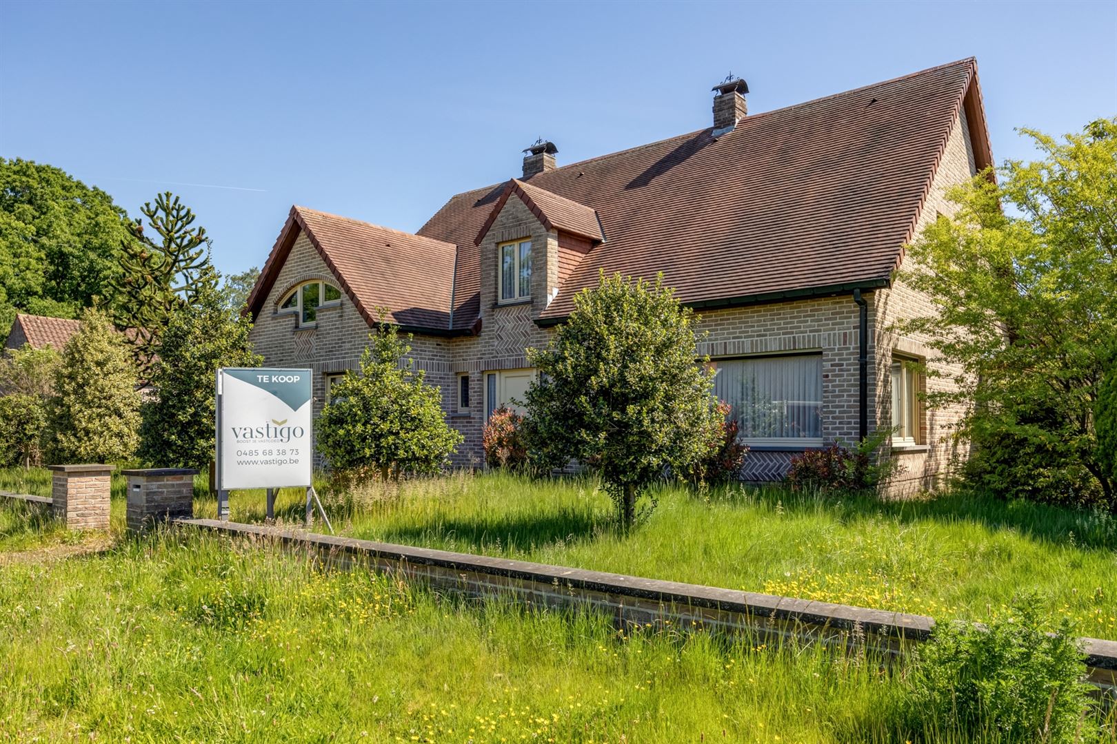 Ruime, lichte villa met bijgebouw op toplocatie.  foto {{pictureIndex}}