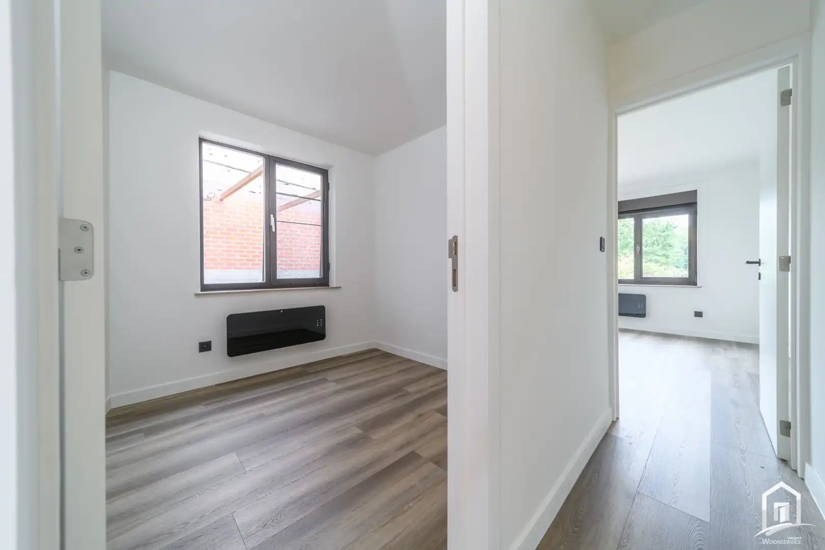 Totaal gerenoveerd gelijkvloers-appartement met tuintje foto 15