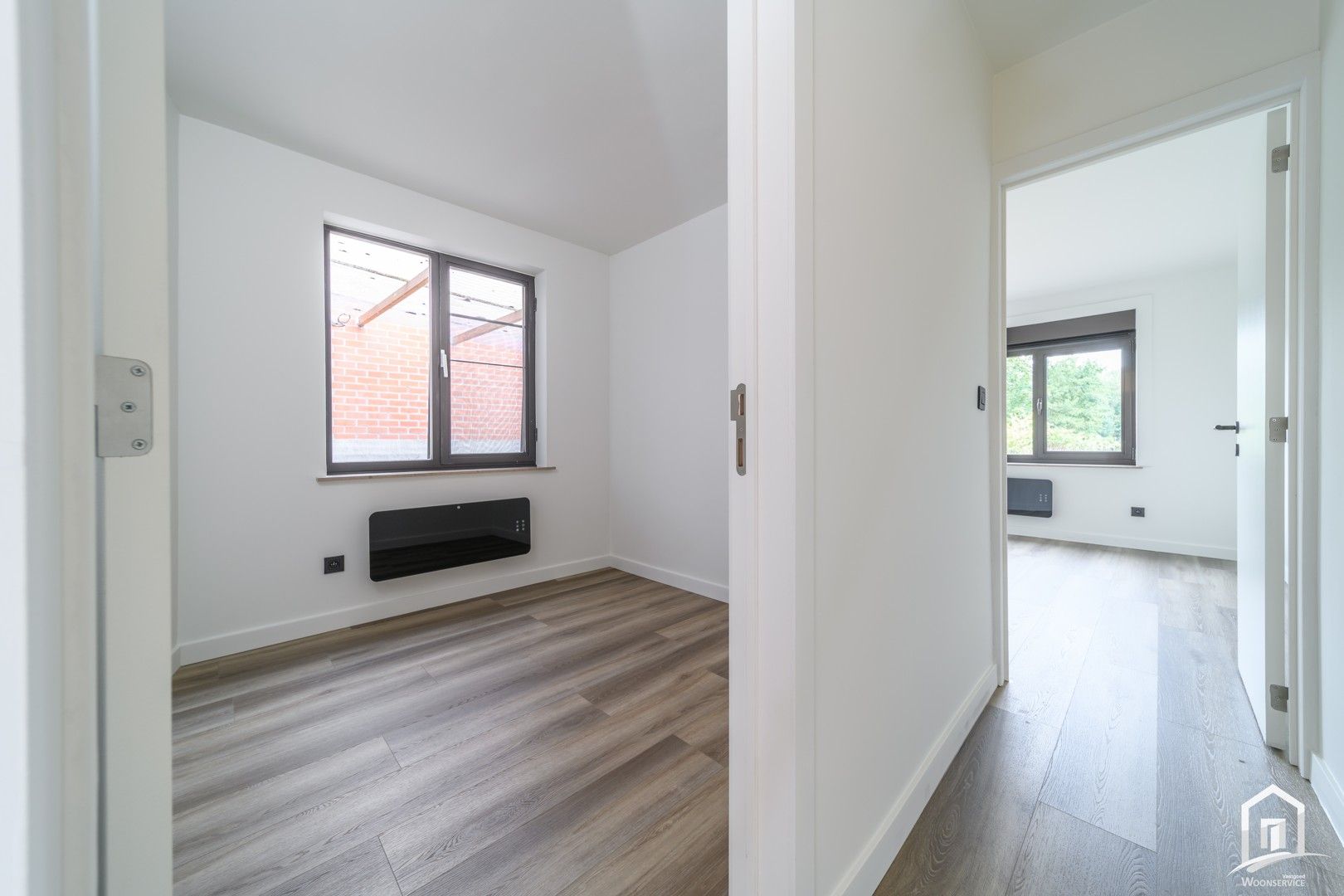 Totaal gerenoveerd gelijkvloers-appartement met tuintje foto 15