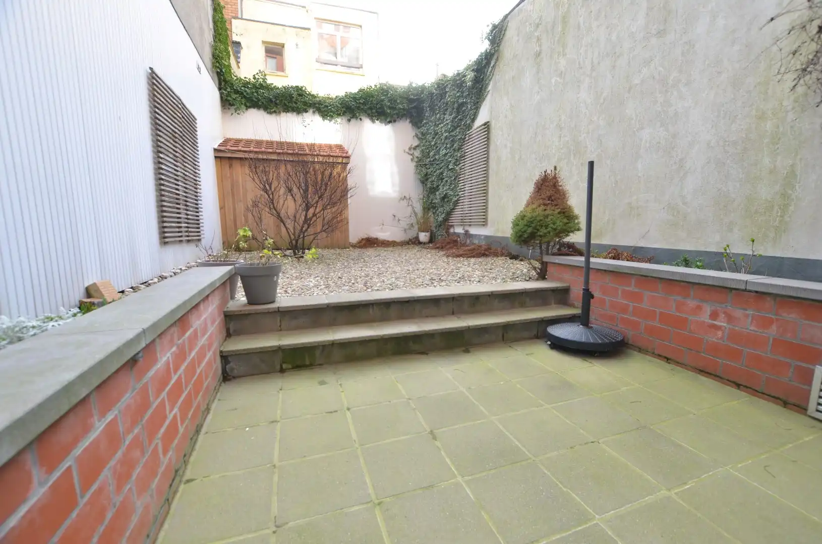 Mooie gelijkvloerse studio met tuin/terras foto 5