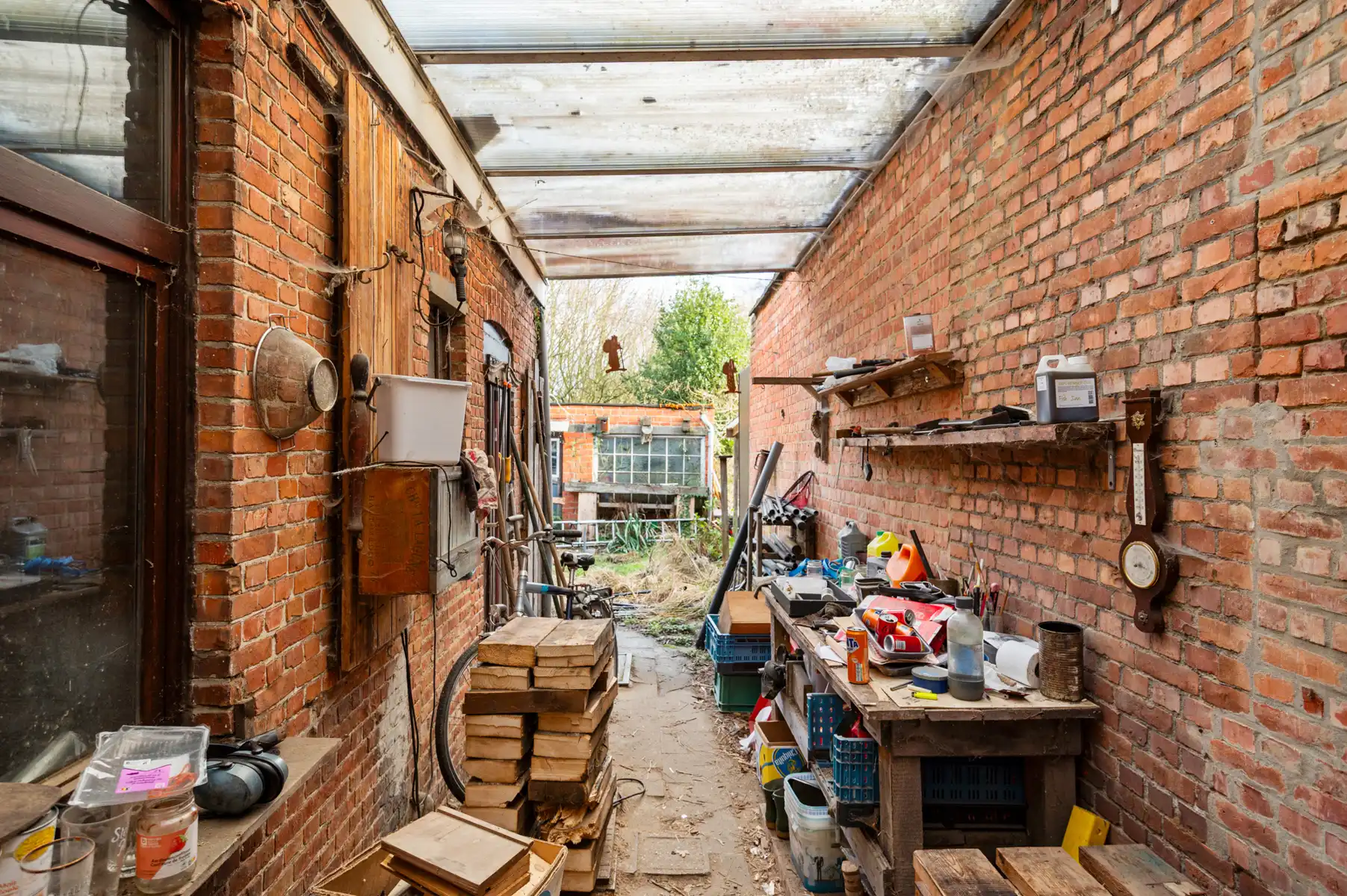 Te renoveren rijwoning met 3 à 4 slaapkamers en ruime tuin. foto 8