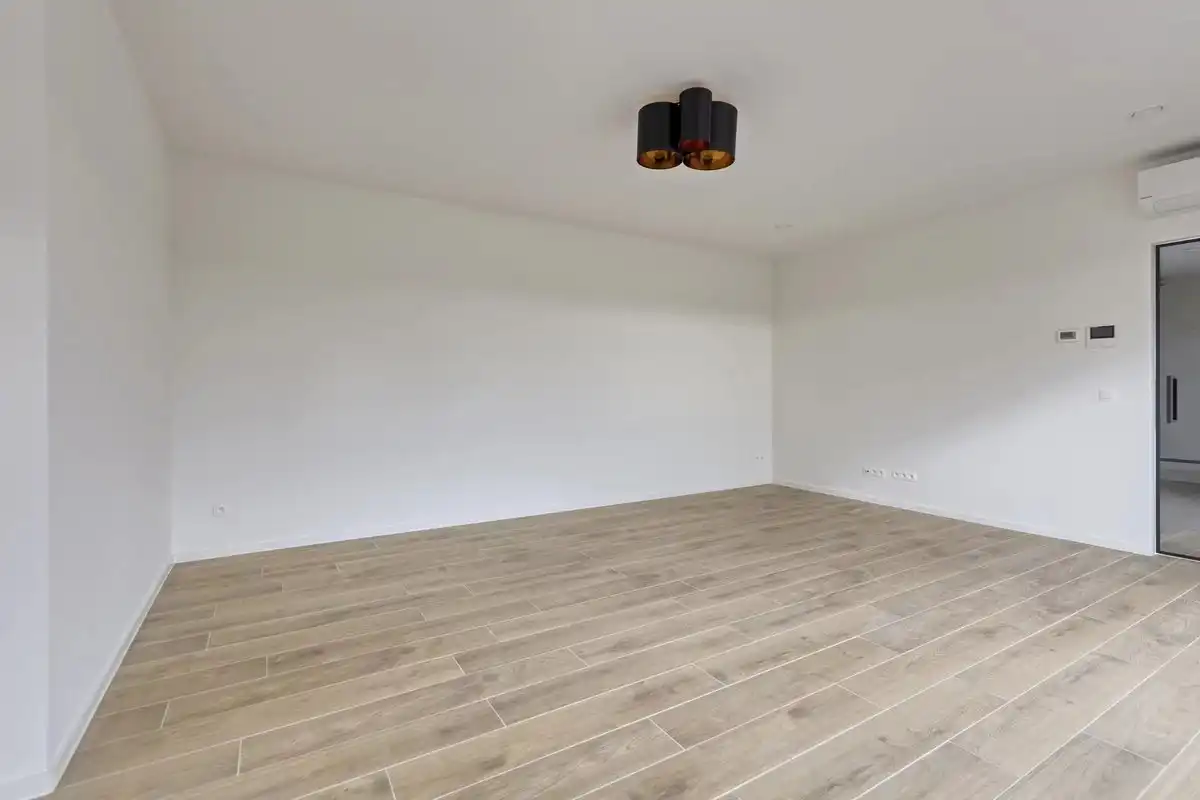 EXCLUSIEF EN KWALITATIEF NIEUWBOUWAPPARTEMENT VAN 163 M² MET 3 SLPK'S, 2 BADK'S EN RIANTE TERRASSEN IN MUNSTERBILZEN foto 6