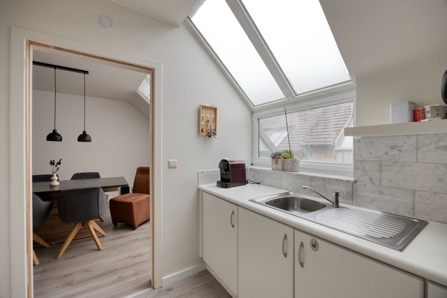 Instapklaar appartement met 2 slaapkamers en garage in het centrum van Lanaken! foto 14