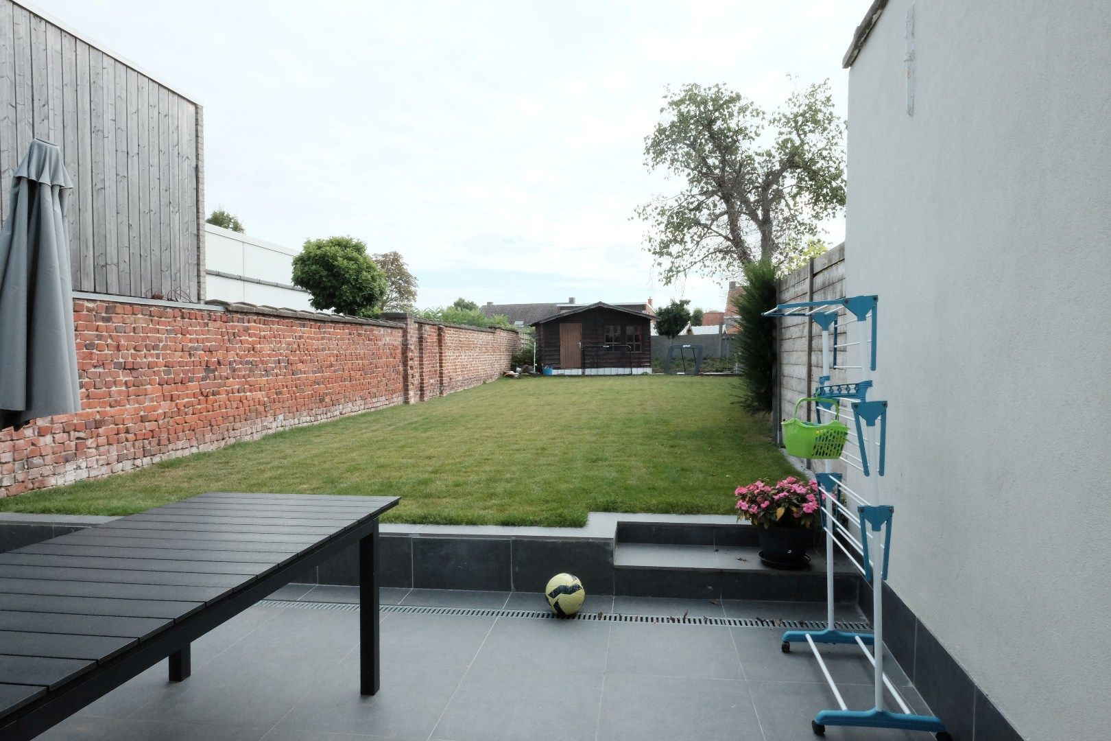 Volledig vernieuwde ruime rijwoning met tuin. foto 15