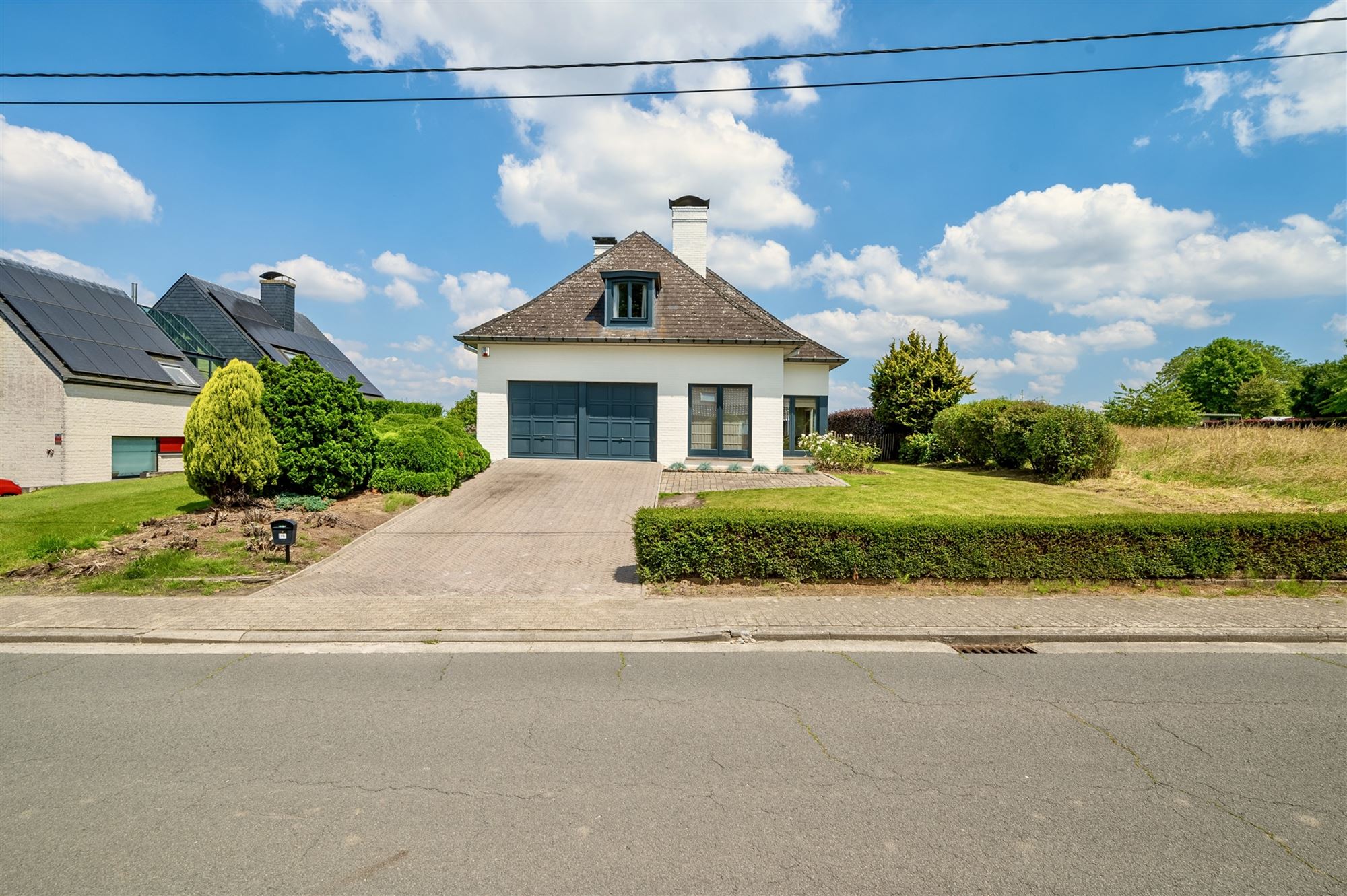 Riante woning met 3 slpks, dubbele garage en uniek zicht foto 3