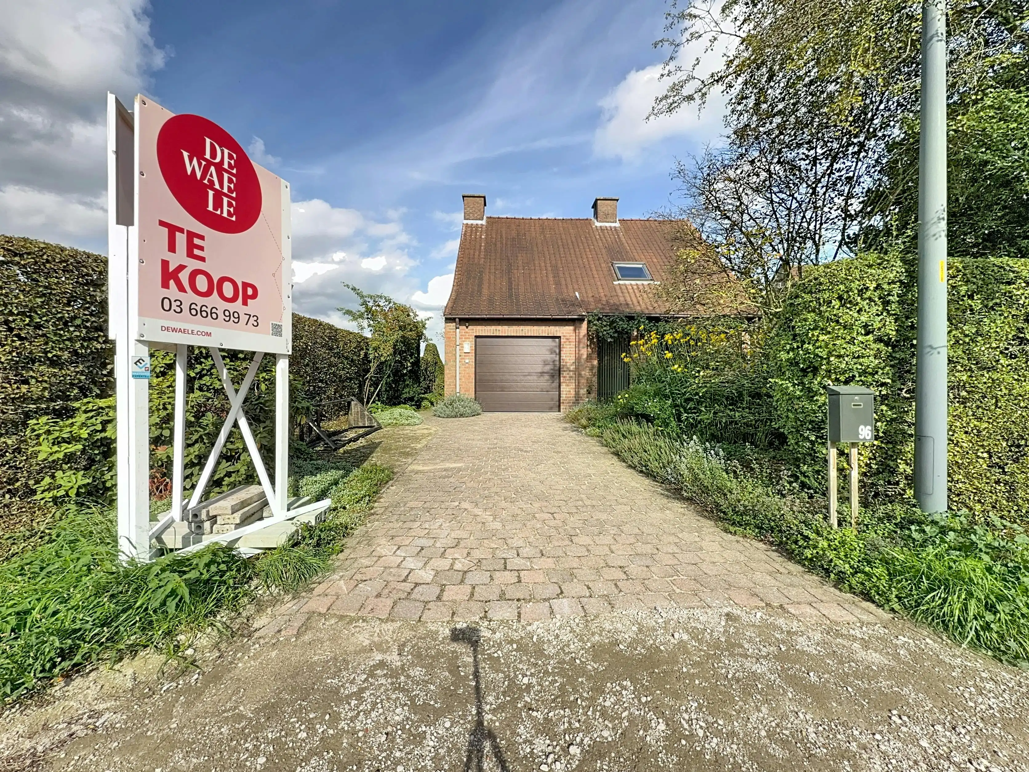Ruime gezinswoning met groene tuin te koop in Wuustwezel! foto 4