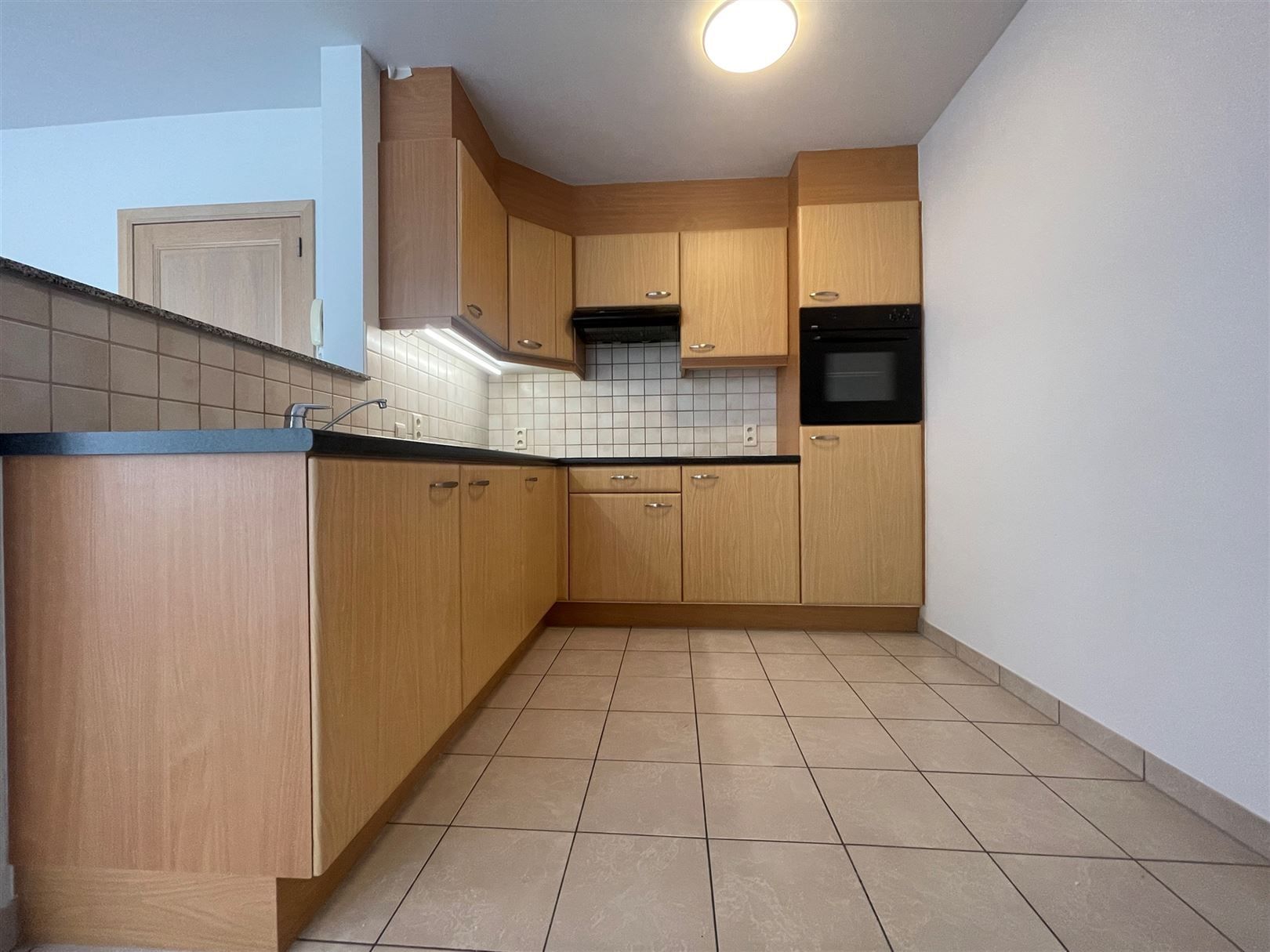 Gelijkvloerse appartement  met afgesloten koer  foto 6