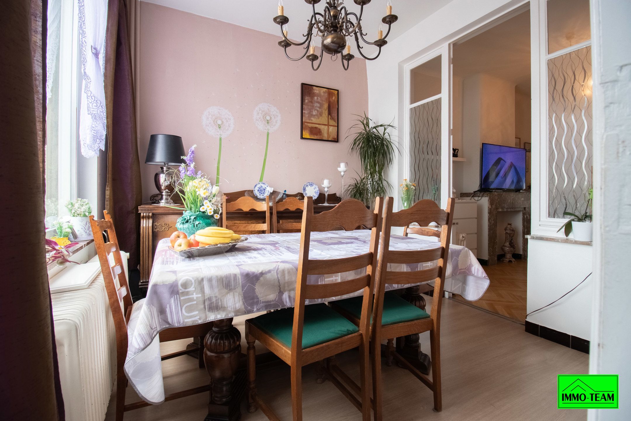 Opbrengsteigendom met 2 appartementen en autostaanplaatsen foto 4
