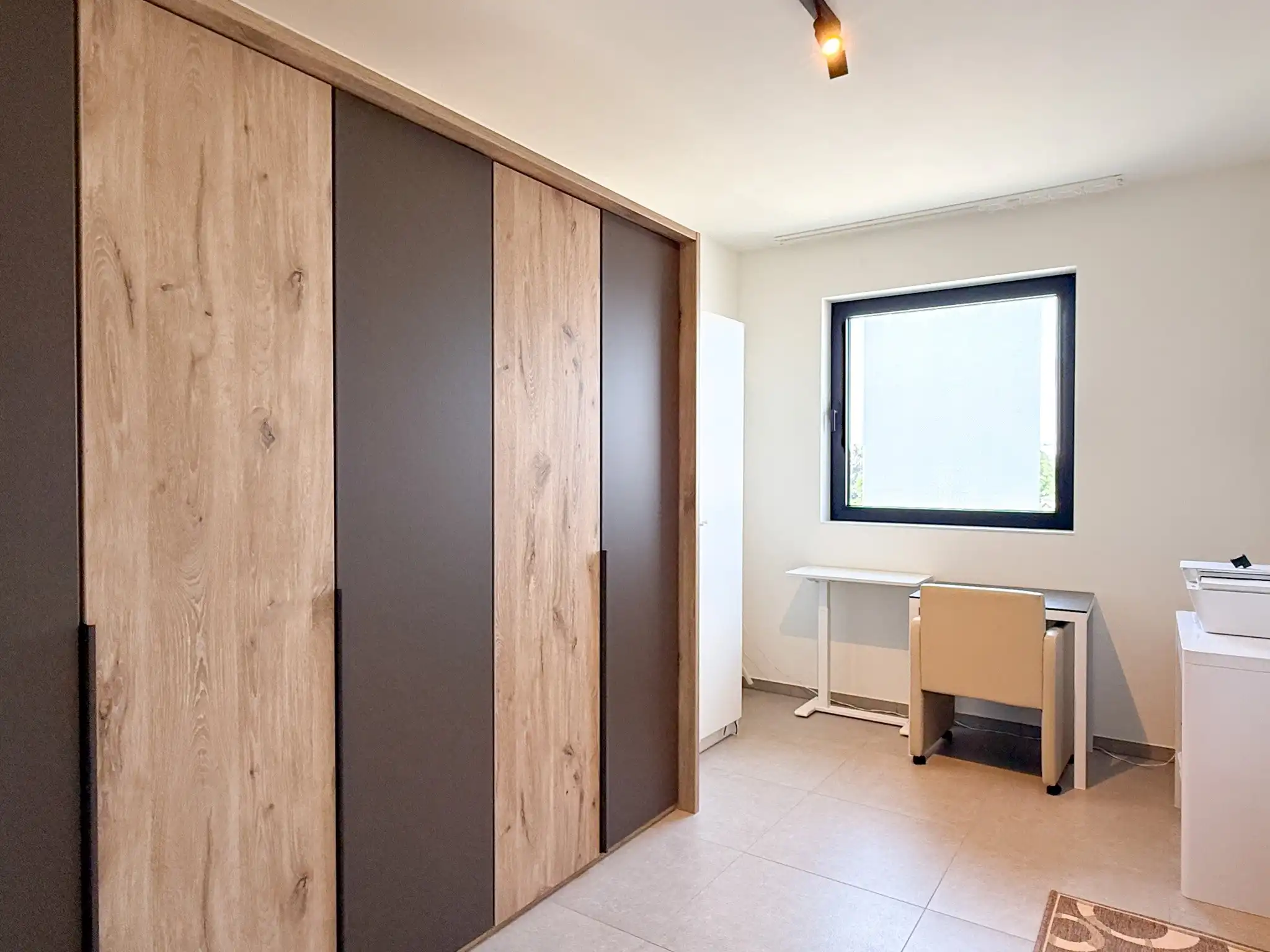 Ruim  nieuwbouwappartement van 113m² met twee slaapkamers , terras en autostaanplaats foto 13