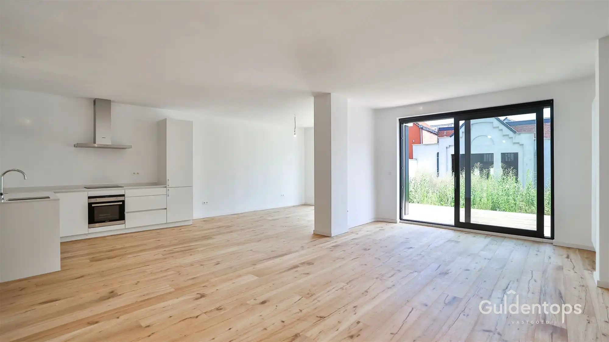 Knap gelijkvloers appartement in hartje Lier met grote tuin foto 13