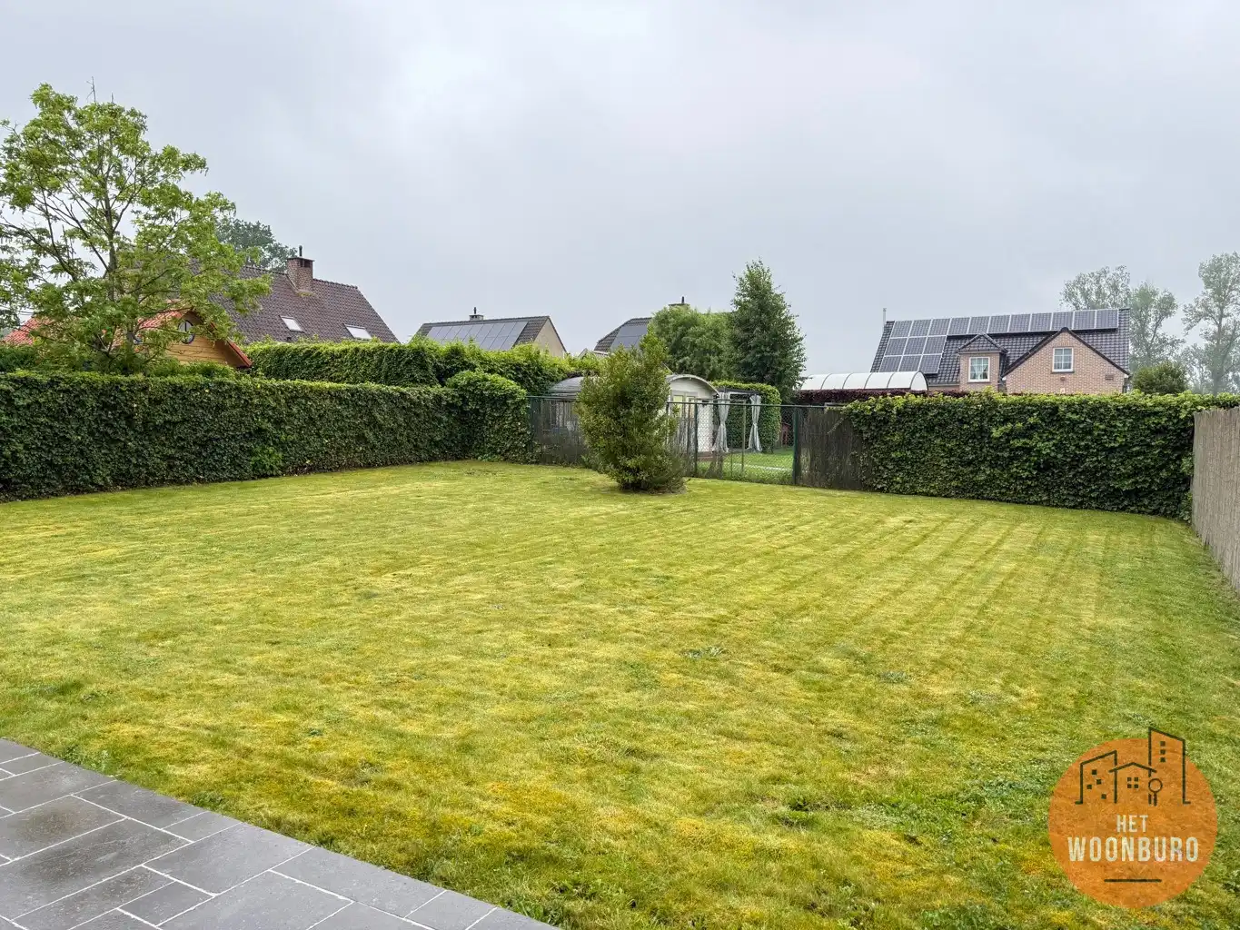 Woning halfopen bebouwing met garage, ruime kelder en tuin foto 22