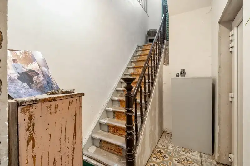 Handelsruimte met woonappartement in het centrum van Wommersom foto 5