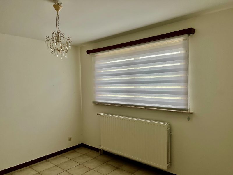 NABIJ UZ GENT, GELIJKVLOERSAPPARTEMENT MET 2 SLAAPKAMERS EN GARAGE. foto 10