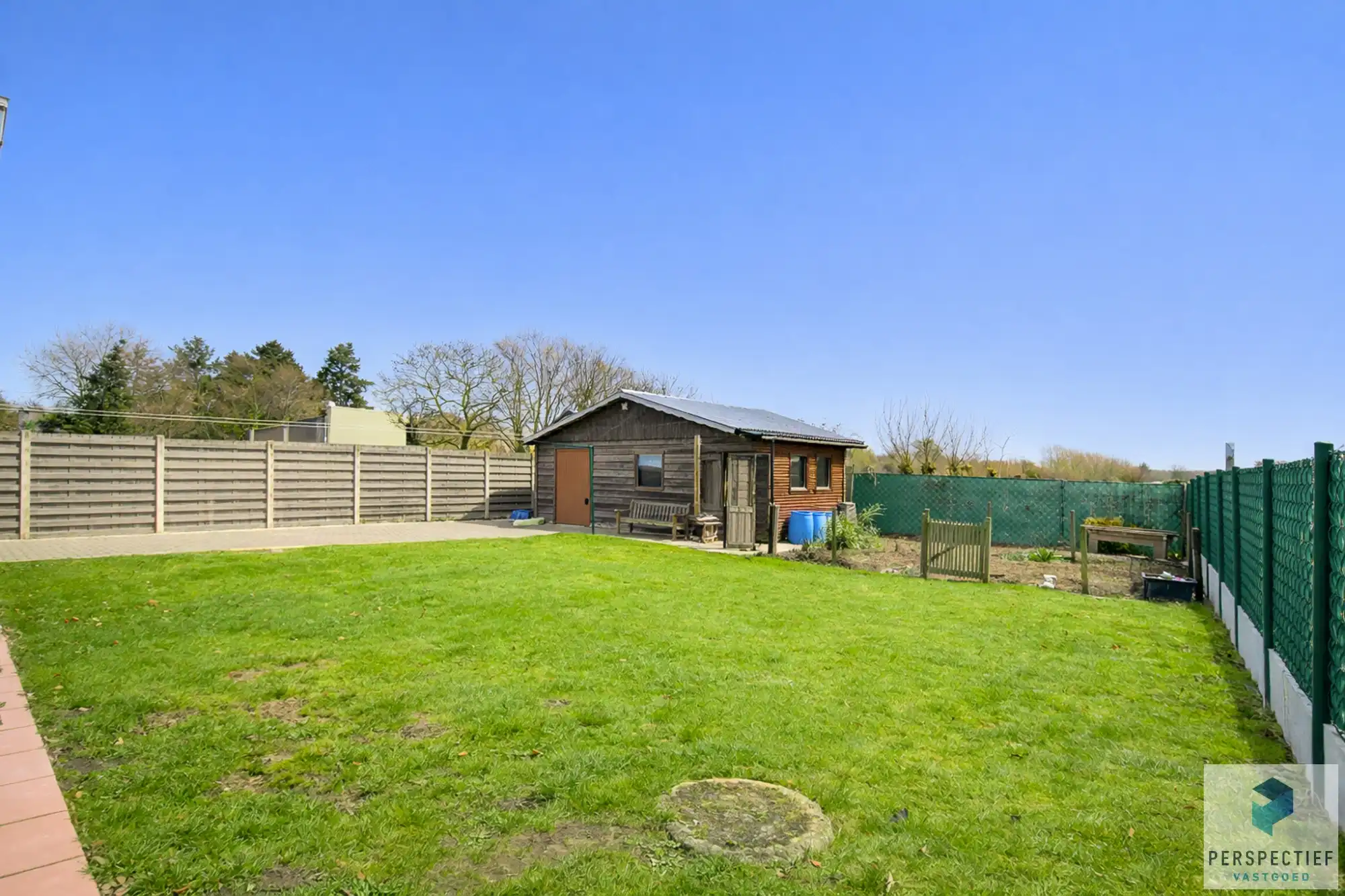 UITSTEKEND GELEGEN GELIJKVLOERSE WONING met 4 slaapkamers en tuin foto 2