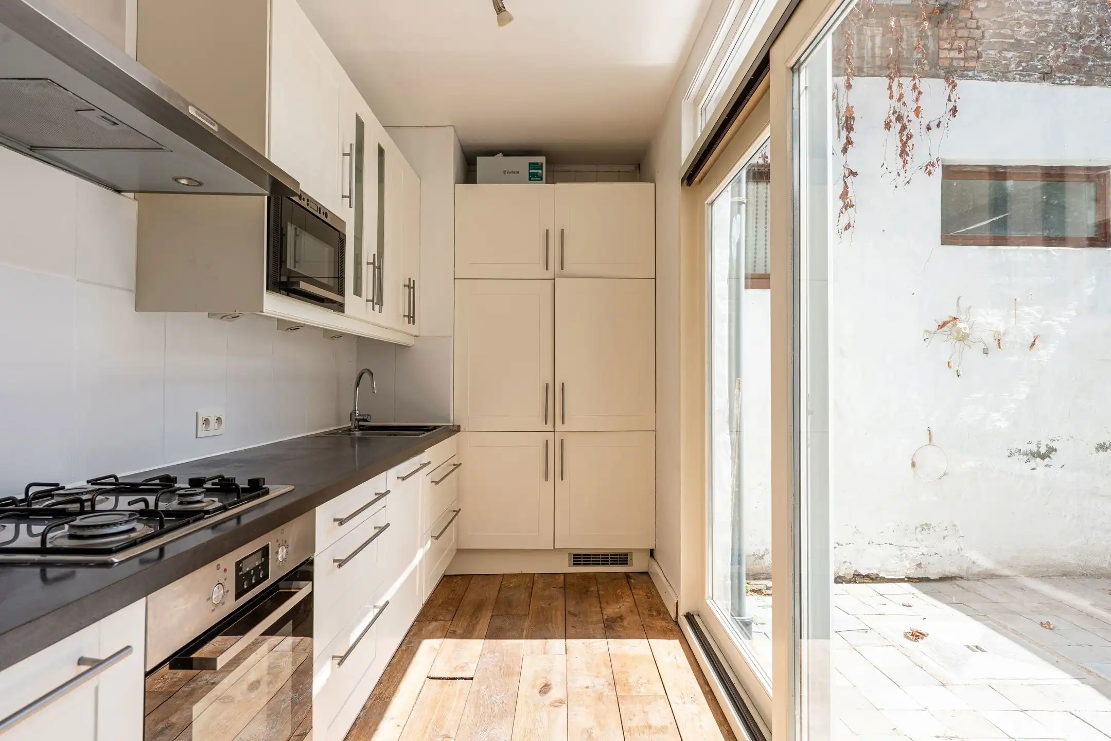 Authentieke stadswoning met 4 slaapkamers en ruime koer nabij Gent foto 6