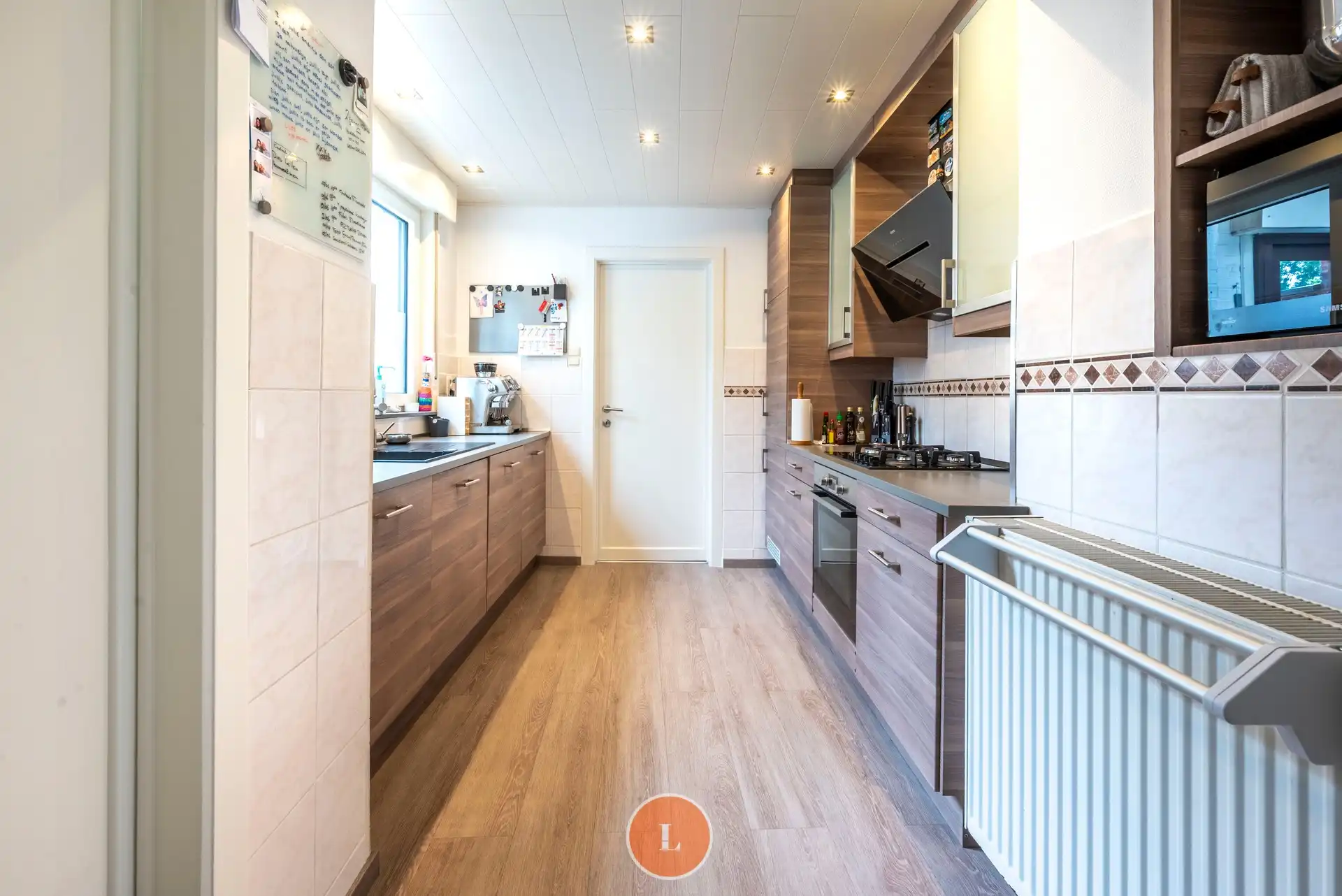 Charmante hoekwoning met onderhoudsvriendelijke stadstuin op centrale ligging in Menen foto 6
