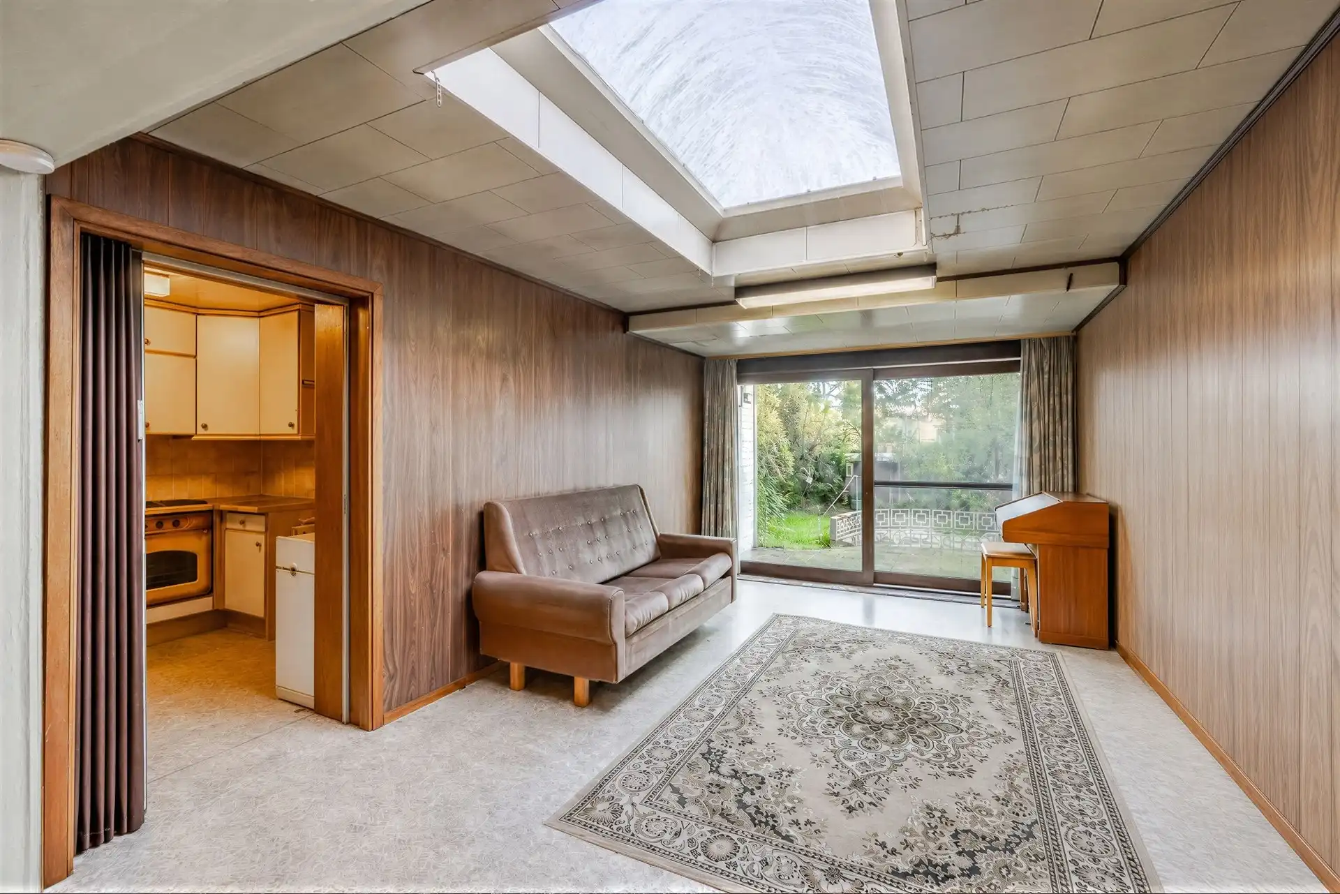 Charmante rijwoning met garage en groene tuin, klaar voor jouw stempel foto 9