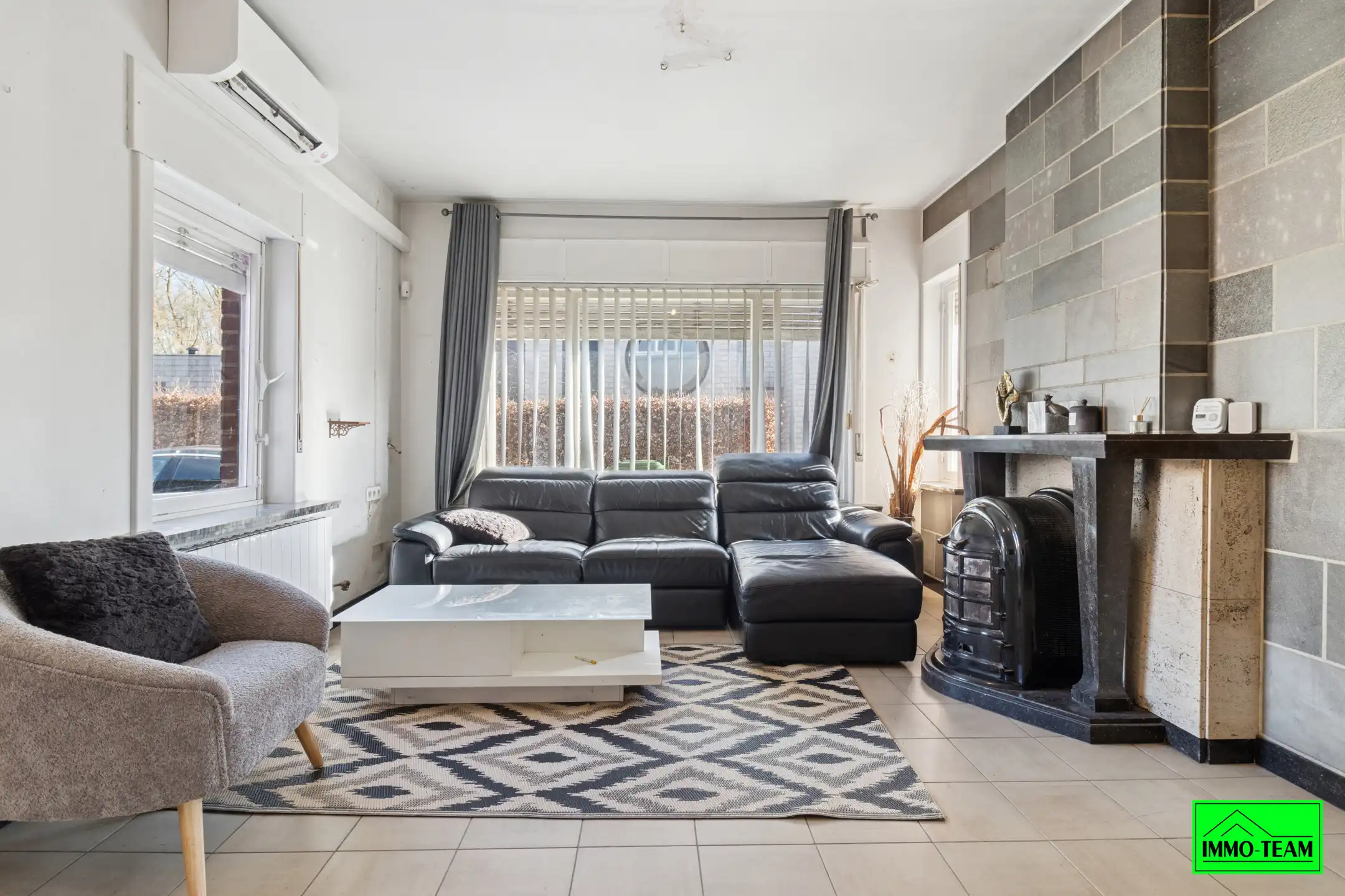 Ruime 3-gevelwoning met 4 slaapkamers en tuin foto 2