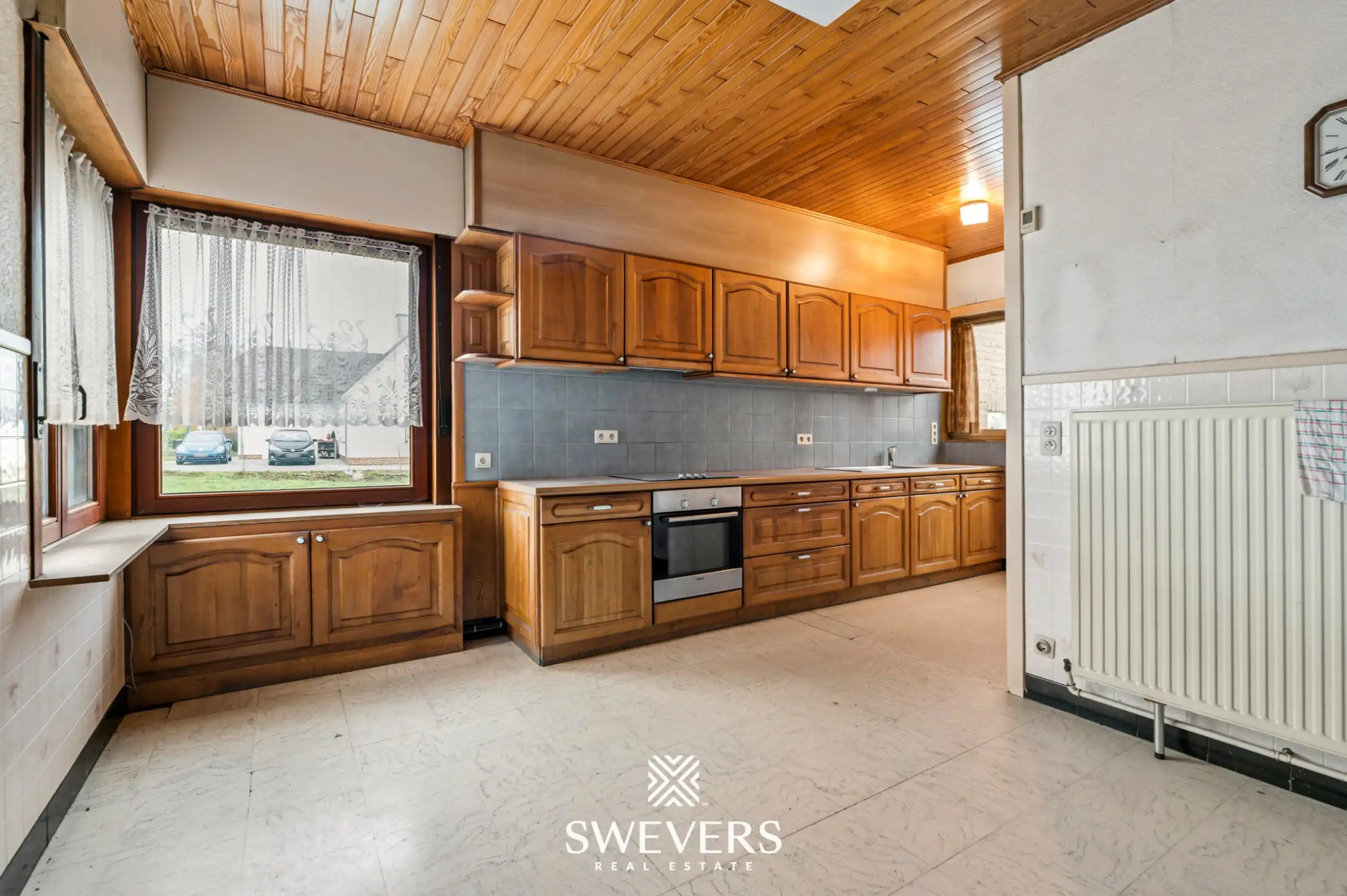 Te renoveren halfopen woning met ruim perceel in Diest foto 6