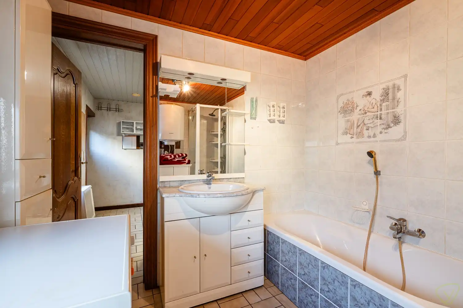 Charmante gesloten bebouwing met ruime tuin en renovatiepotentieel foto 11