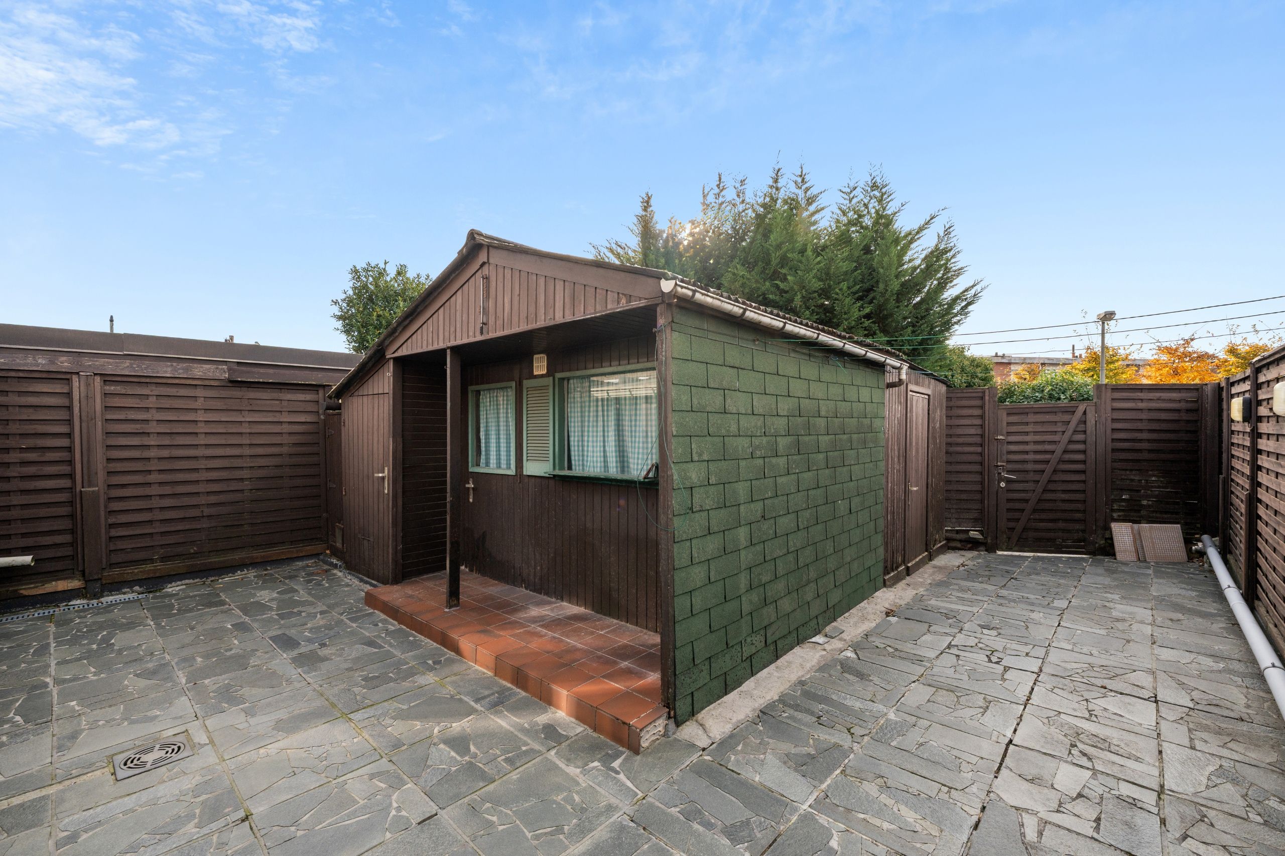 Op te frissen rijwoning op 197m2 in een centraal gelegen buurt foto 16