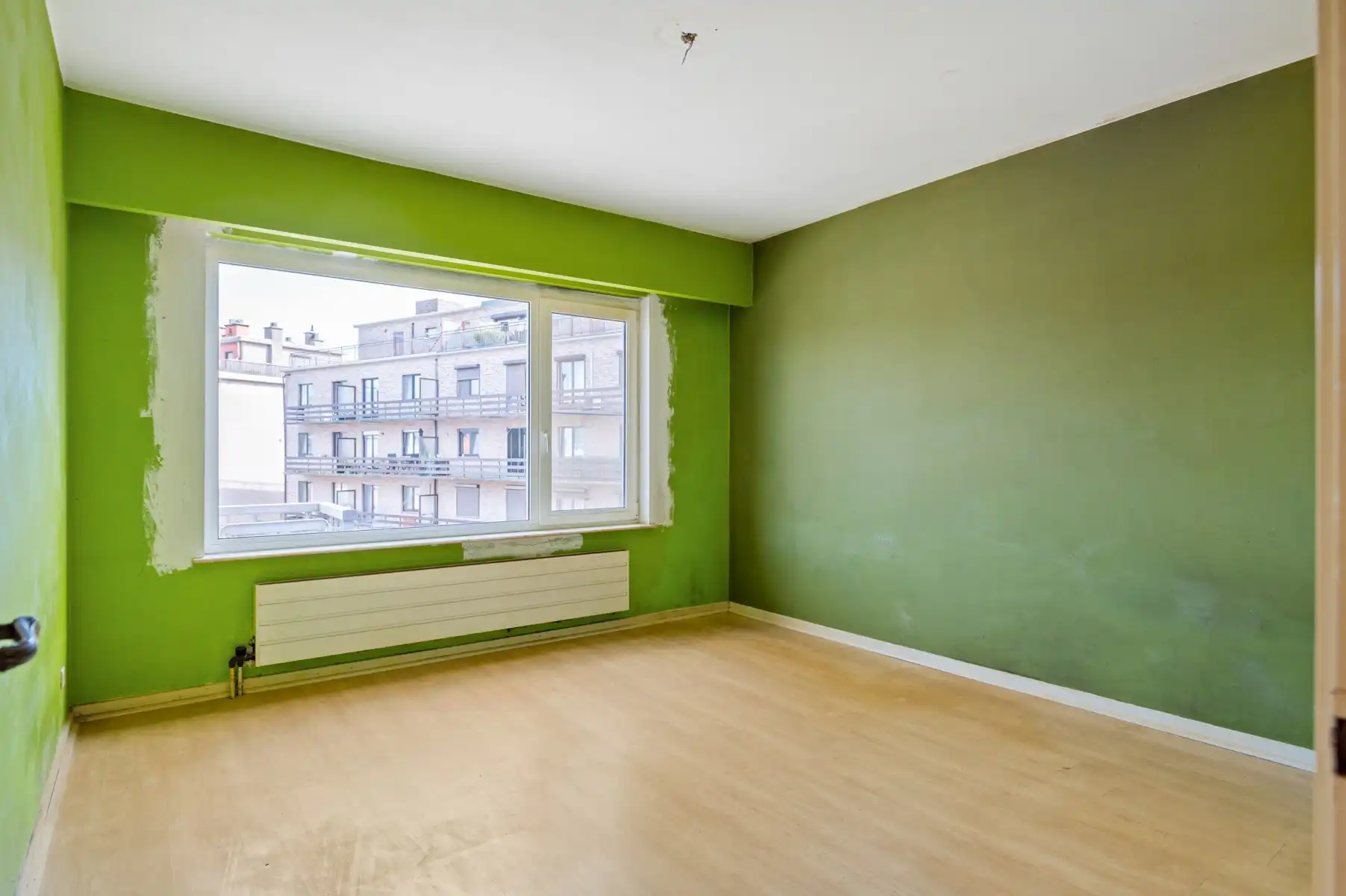 Goed gelegen 3-slaapkamerappartement met garage foto 10
