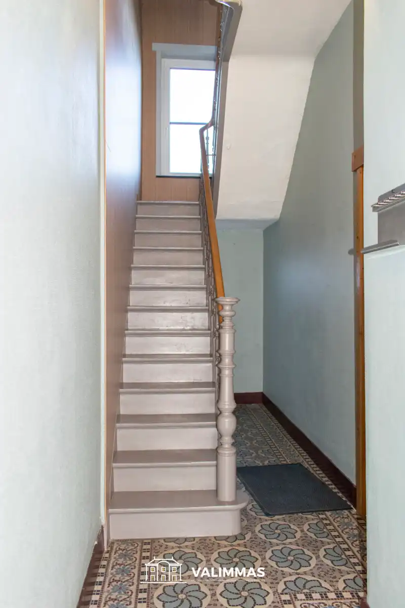 Degelijke, verzorgde en ruime rijwoning met tuin, parking... foto 3