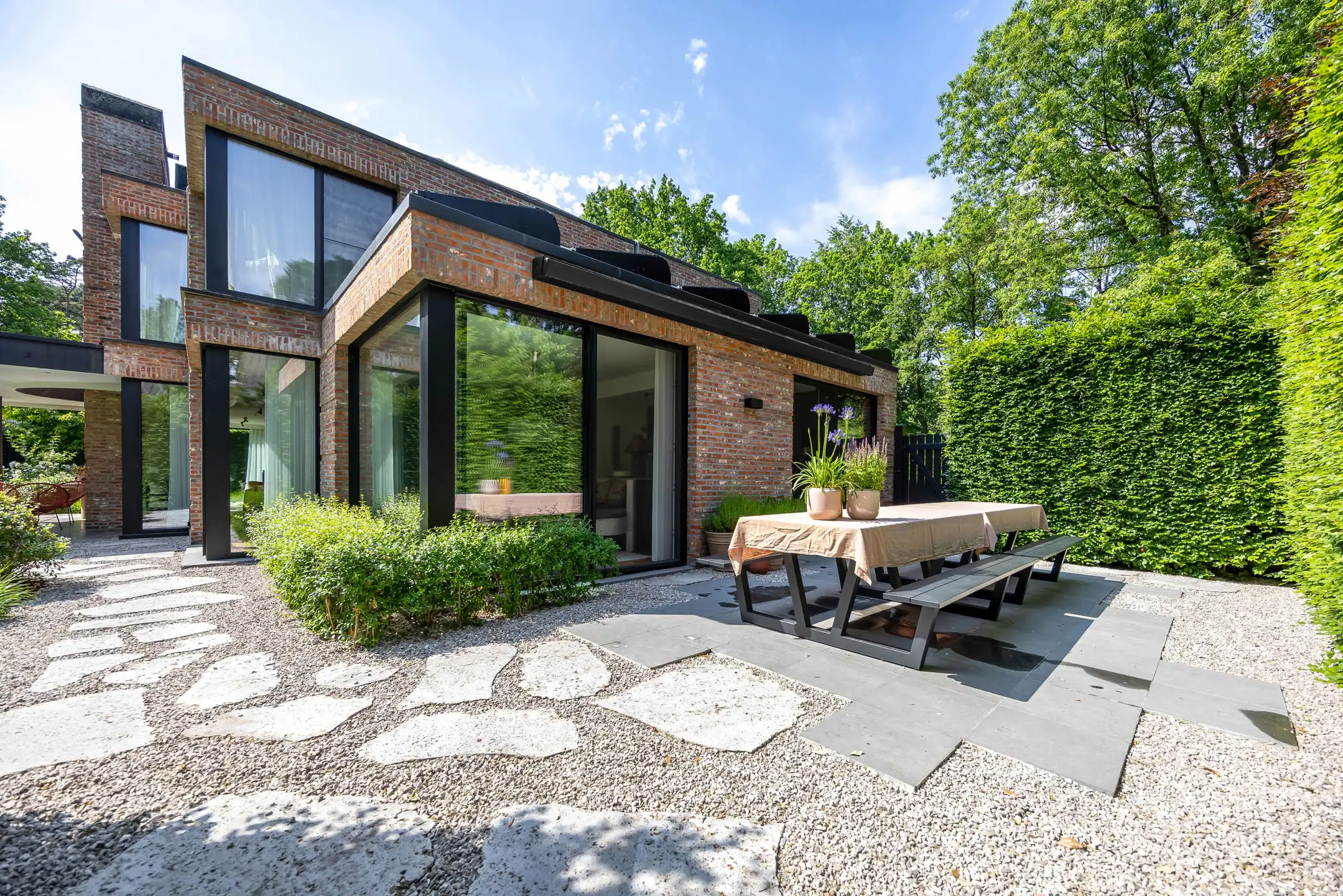 Architectenvilla met zwembad en ZW tuin in Hof Ter Linden foto 17