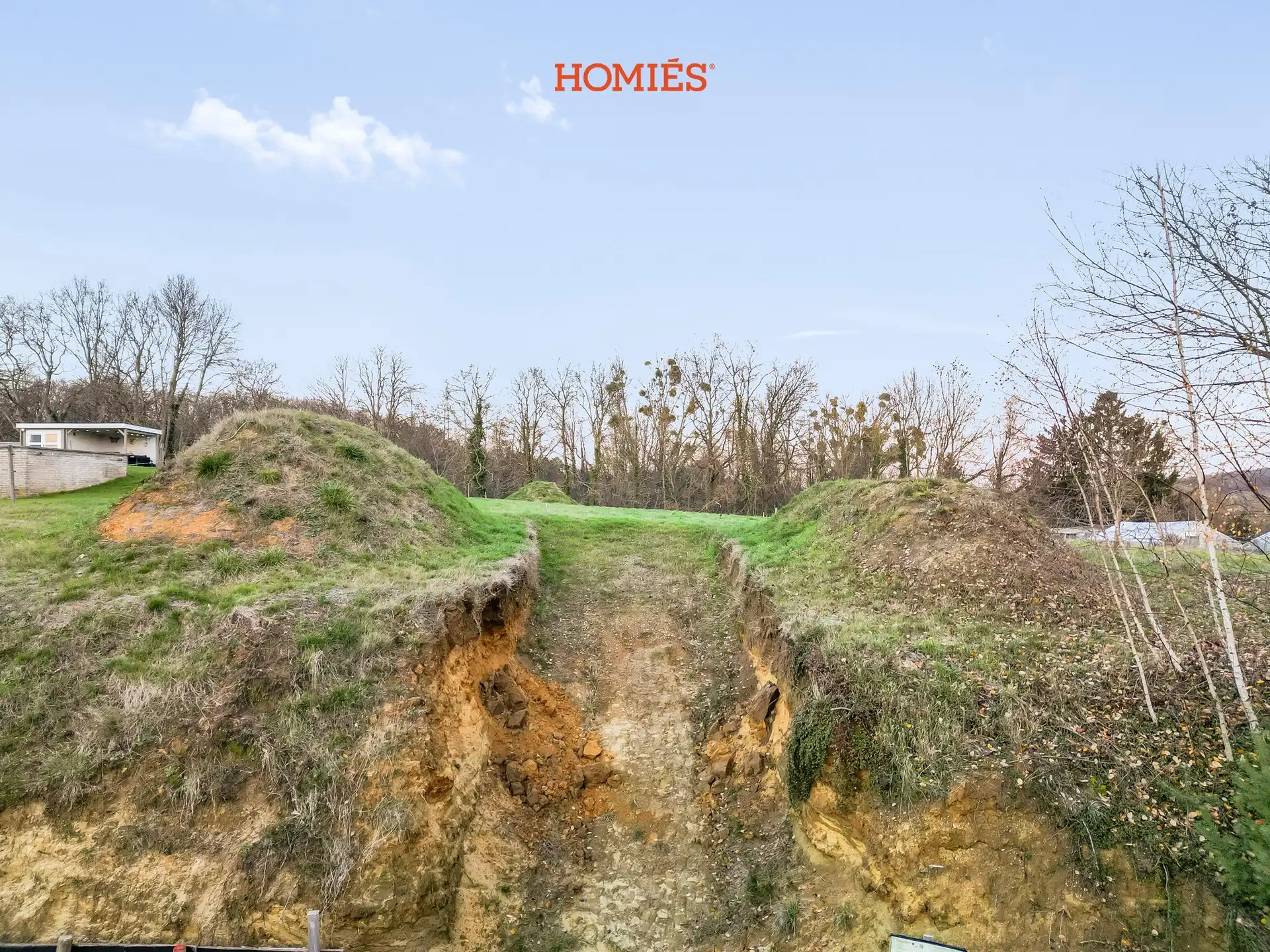 Ruime bouwgrond in groene omgeving foto 8