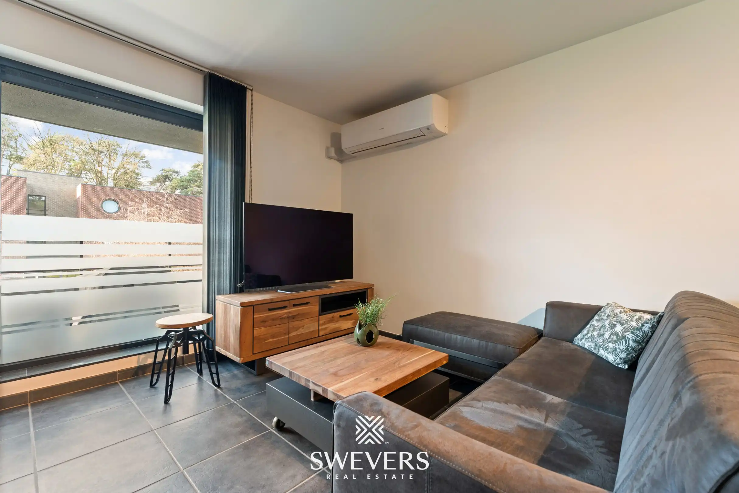 Ruim instapklaar appartement met 3 slaapkamers, zonnig terras en ondergrondse parking te Genk (EPC: A) foto 5