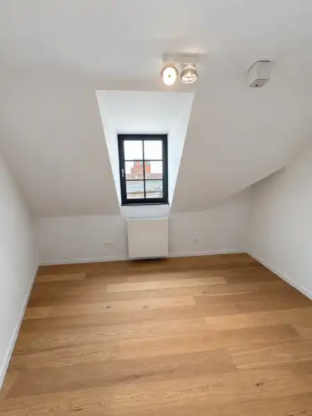 Stijlvol dakappartement met terras en veel privacy in het centrum van Geel foto 15